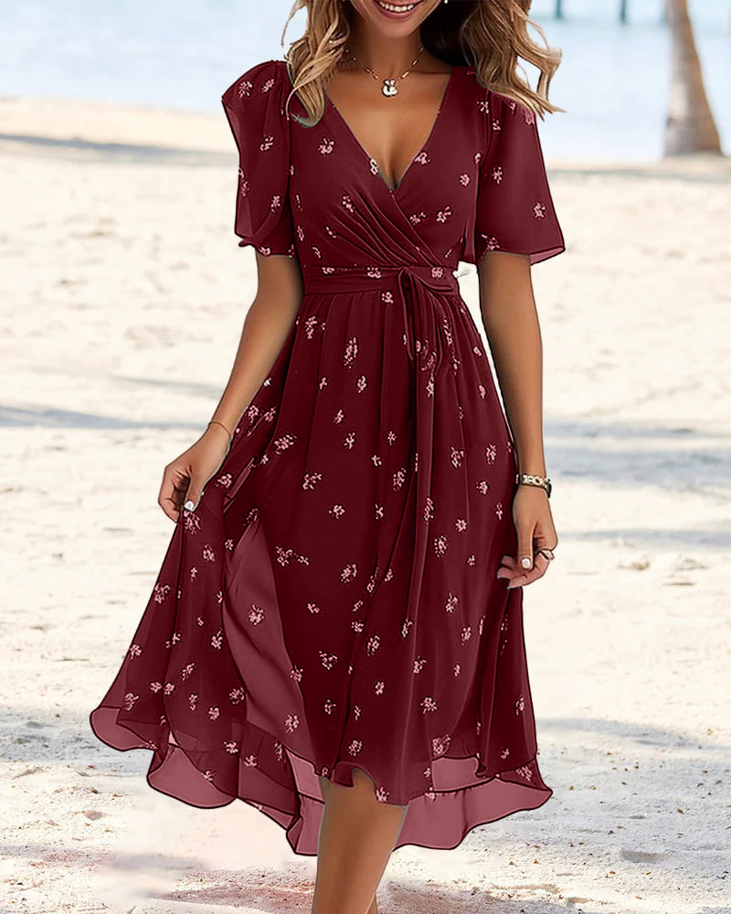 Leoza - Elegantes bedrucktes Kleid mit V-Ausschnitt und Krawatte